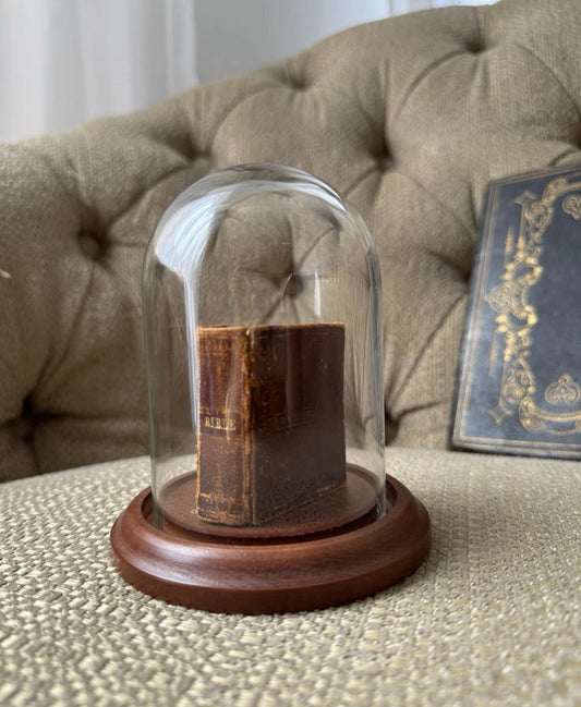 Display of Antique Miniature Bible 1857 In A Glass Dome
