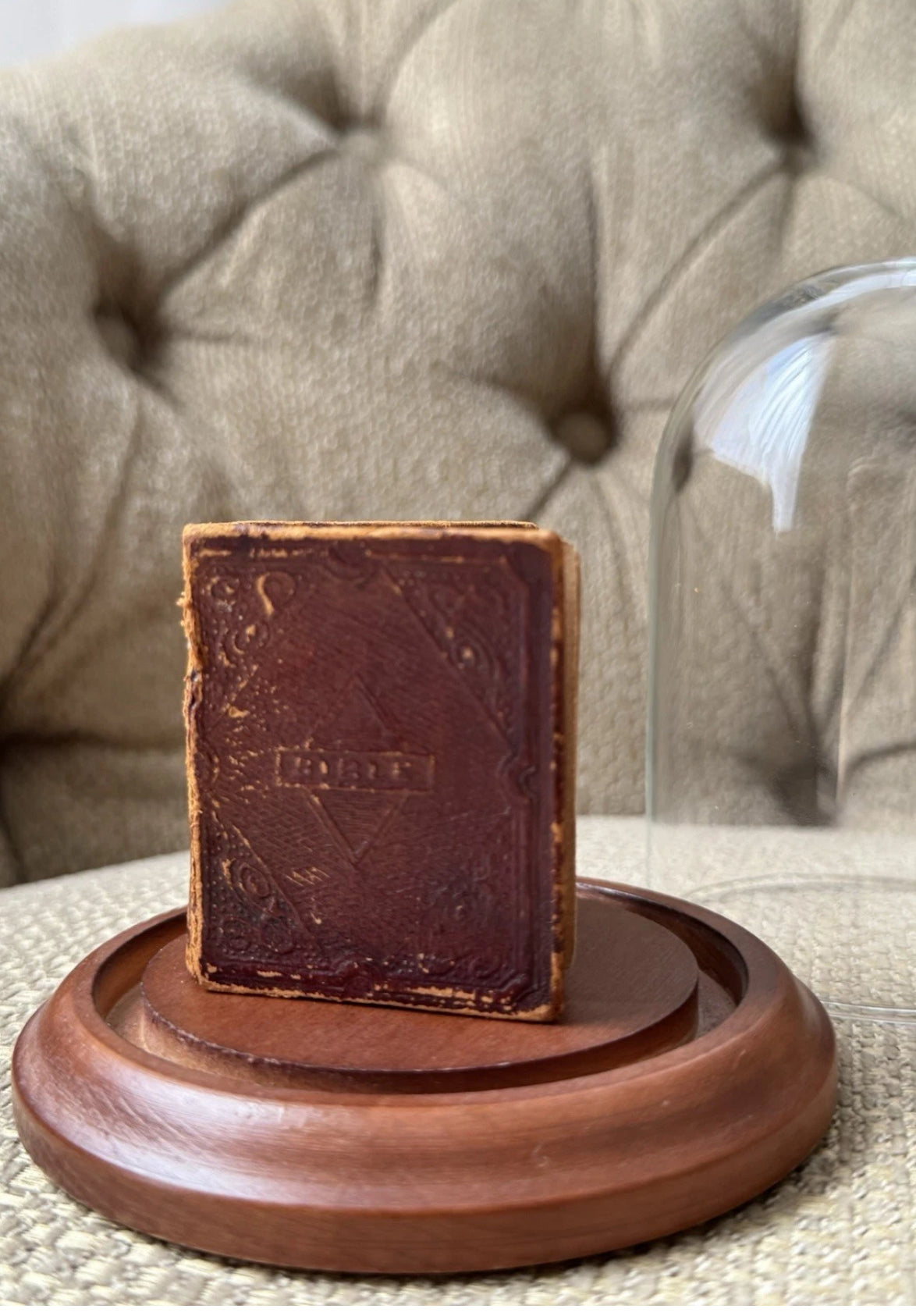 Display of Antique Miniature Bible 1857 In A Glass Dome