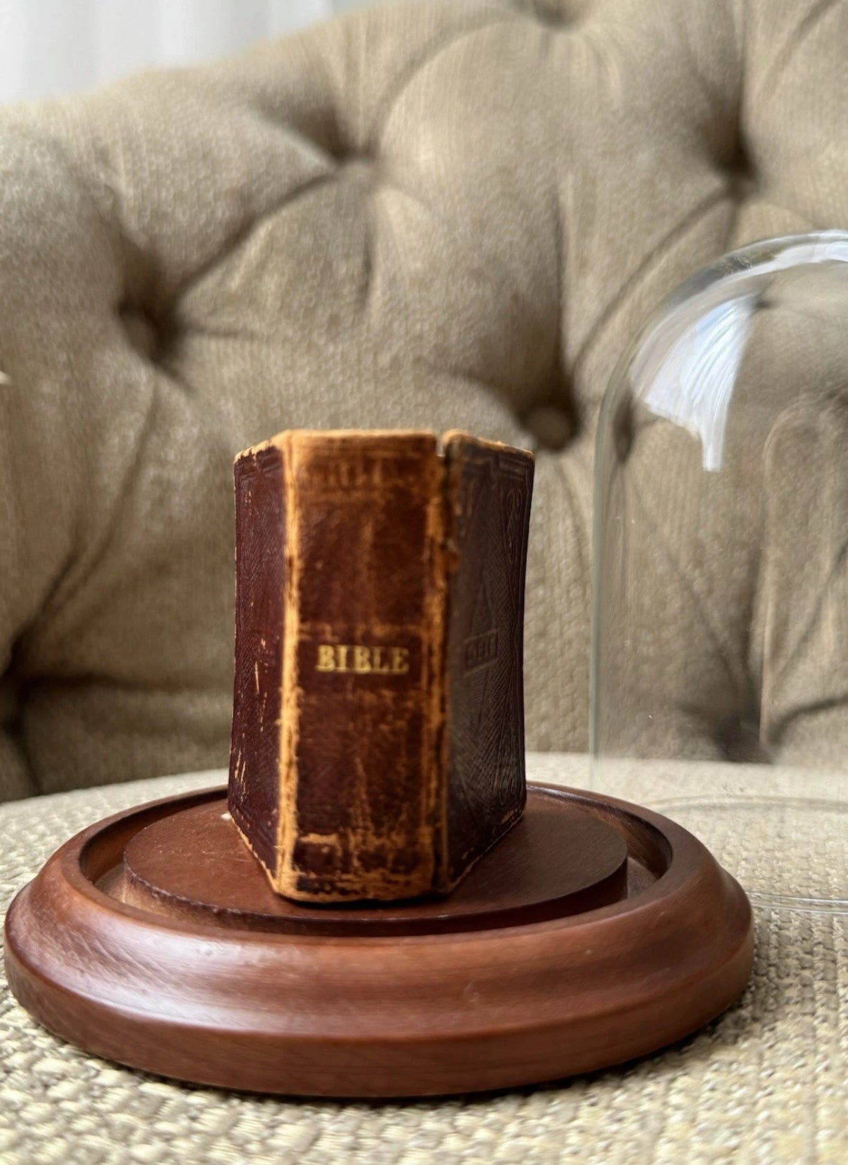 Display of Antique Miniature Bible 1857 In A Glass Dome