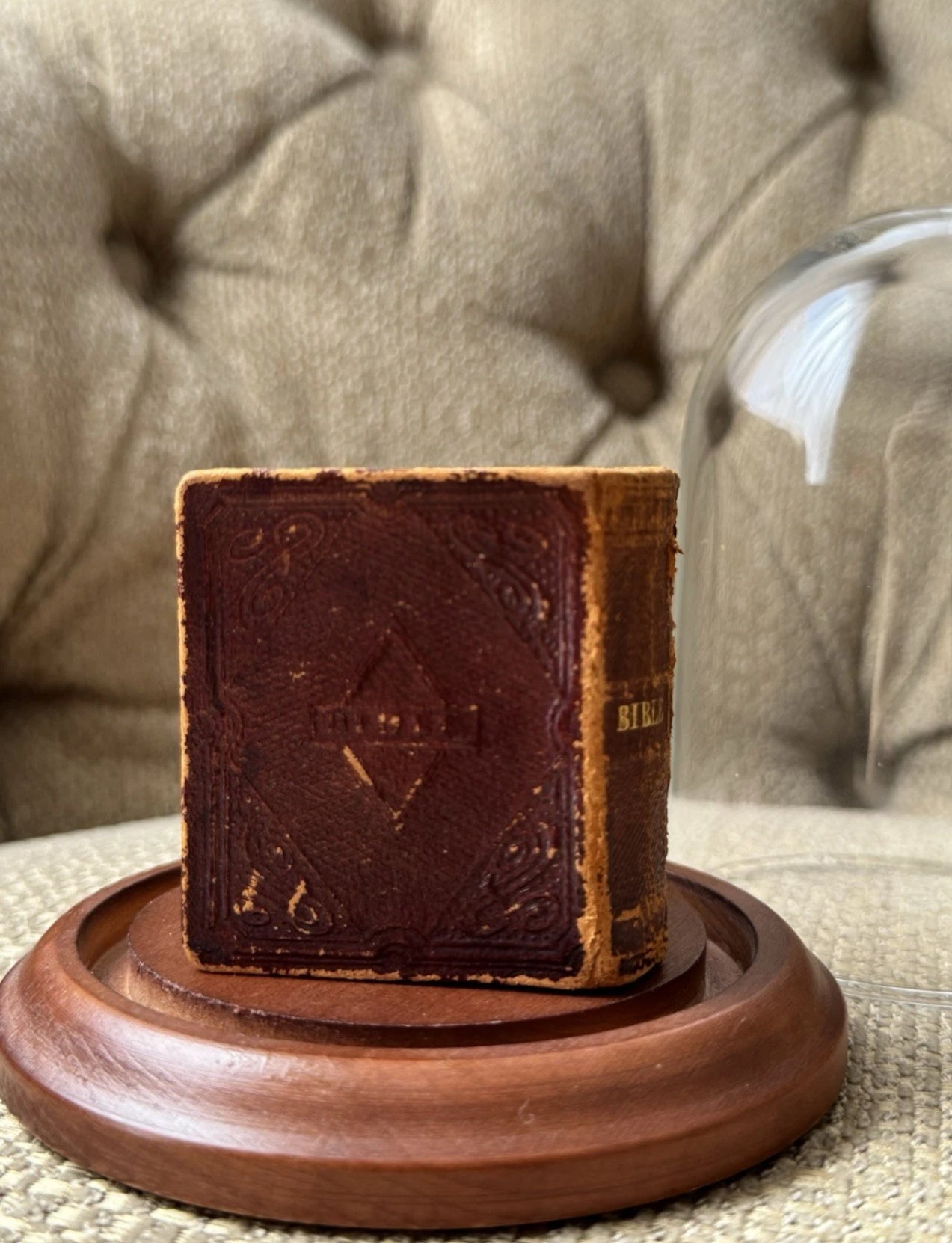 Display of Antique Miniature Bible 1857 In A Glass Dome