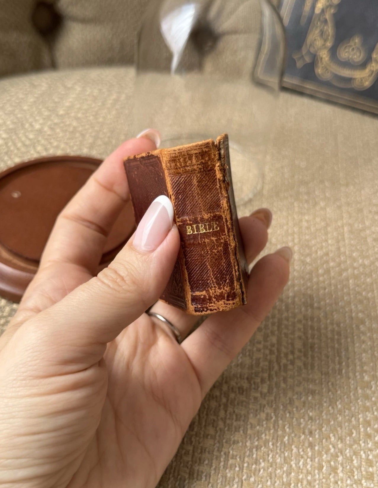 Display of Antique Miniature Bible 1857 In A Glass Dome