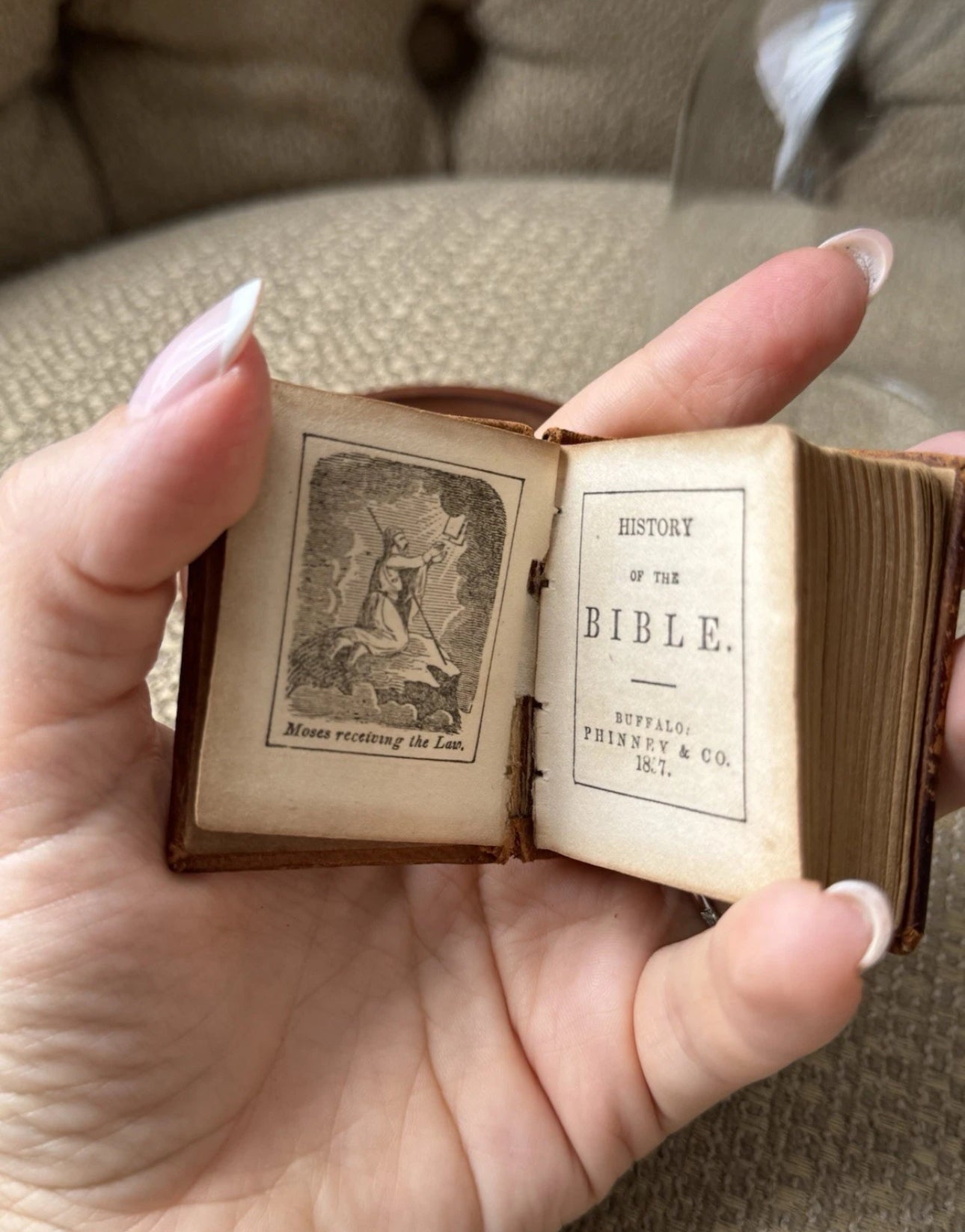 Display of Antique Miniature Bible 1857 In A Glass Dome